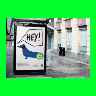 Ein Plakat, das einen Hund im Rollstuhl zeigt und auf Inklusion aufmerksam macht