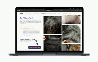 Webseite auf einem Laptop mit weißem Hintergrund