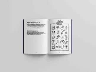 Aufgeschlagenes Buch mit Symbolen